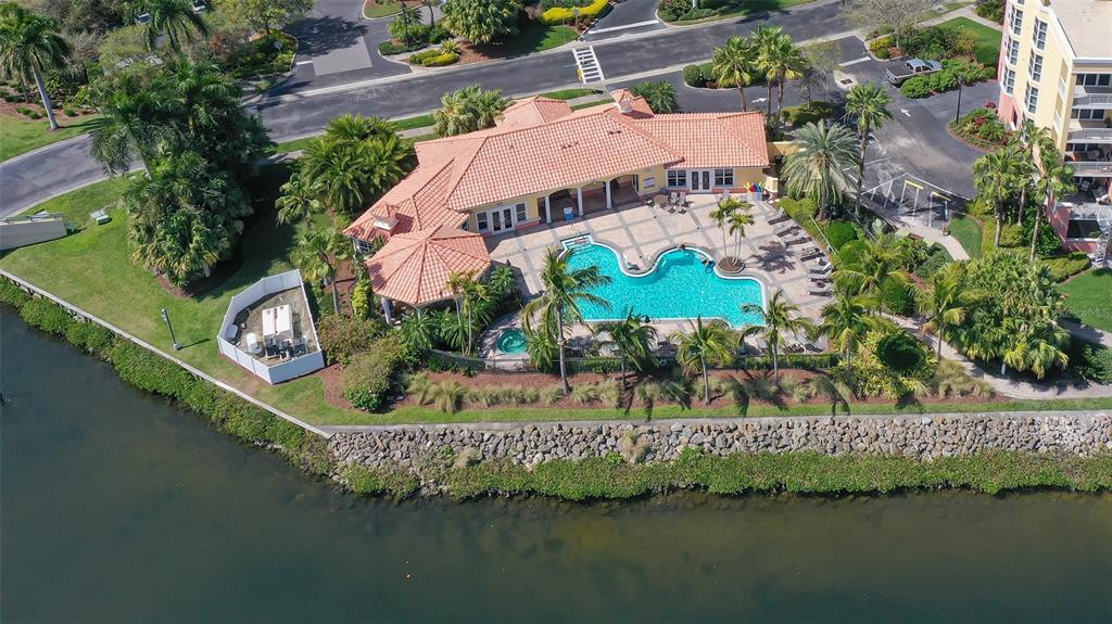 606 Riviera Dunes Way, Unit 306 Palmetto, FL 34221 - Photo 50 of 64 an aerial view of a house with a lake view