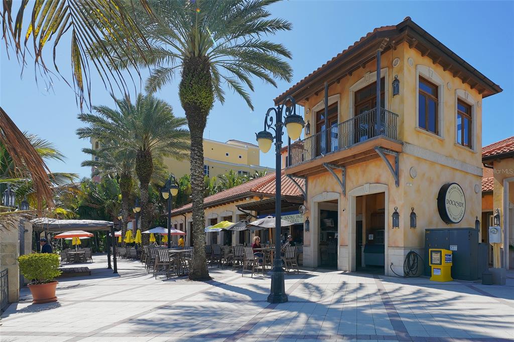 606 Riviera Dunes Way, Unit 306 Palmetto, FL 34221 - Photo 62 of 64 a front view of a building with street