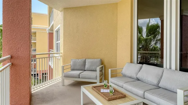 a view of a lake with a palm trees