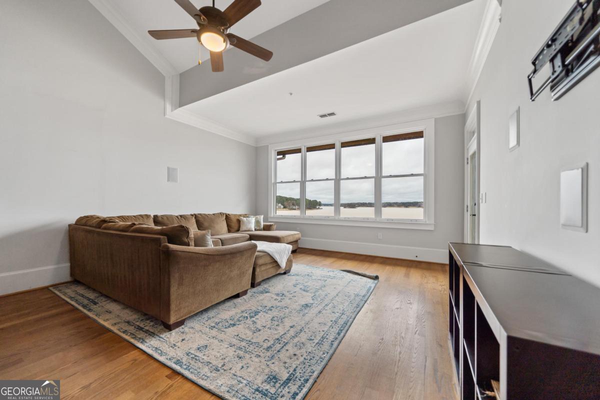116 (unit 311) Indian Summer Path Eatonton, GA 31024 - Photo 11 of 51 a living room with furniture and a large window