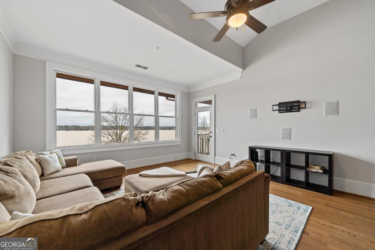 116 (unit 311) Indian Summer Path Eatonton, GA 31024 - Photo 13 of 51 a living room with furniture and a large window