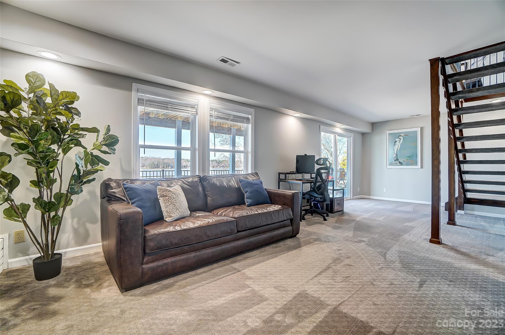 3047 Point Clear Drive Tega Cay, SC 29708 - Photo 29 of 40 a living room with furniture and a potted plant