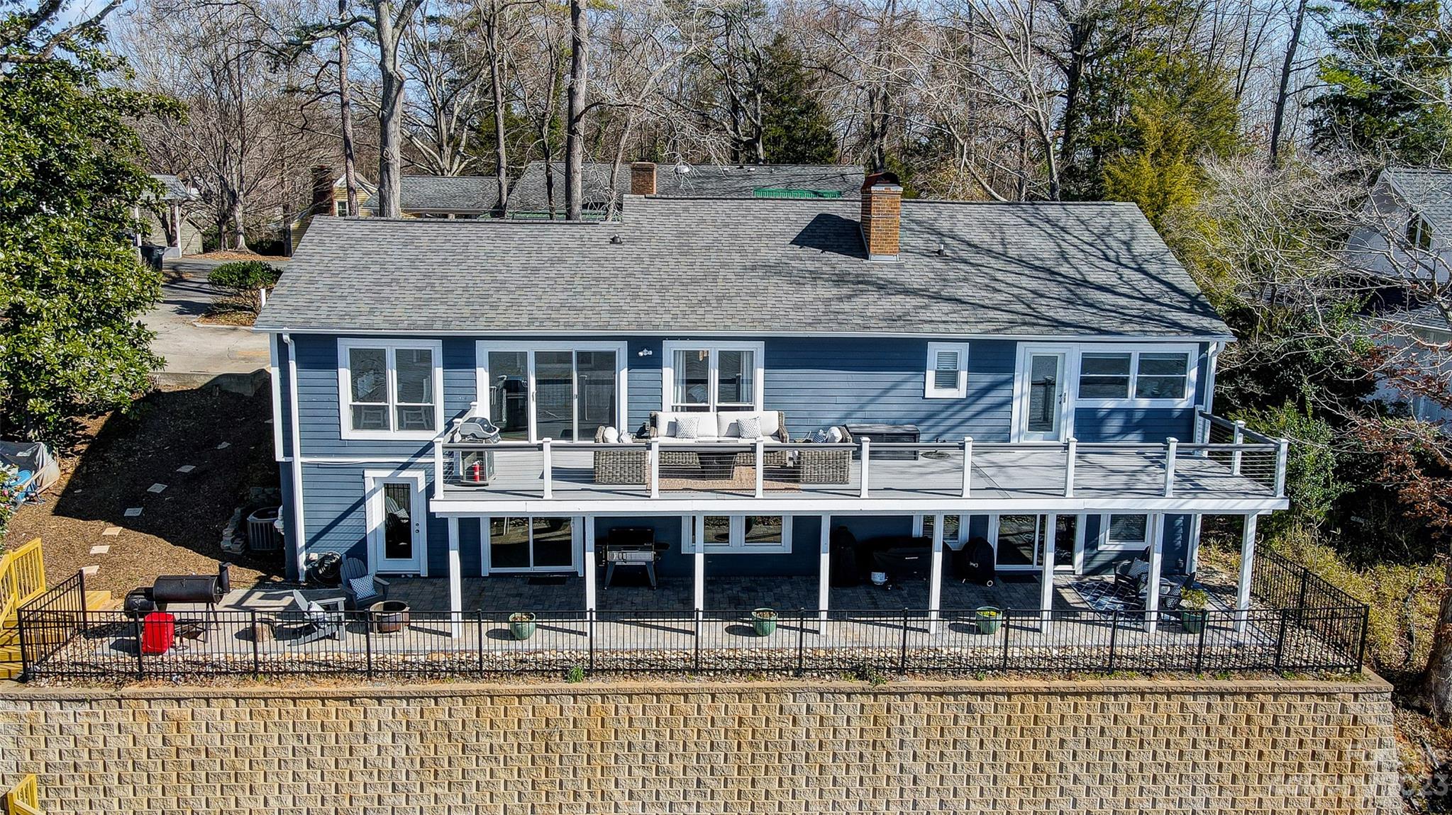 3047 Point Clear Drive Tega Cay, SC 29708 - Photo 3 of 40 a view of house with swimming pool and sitting area