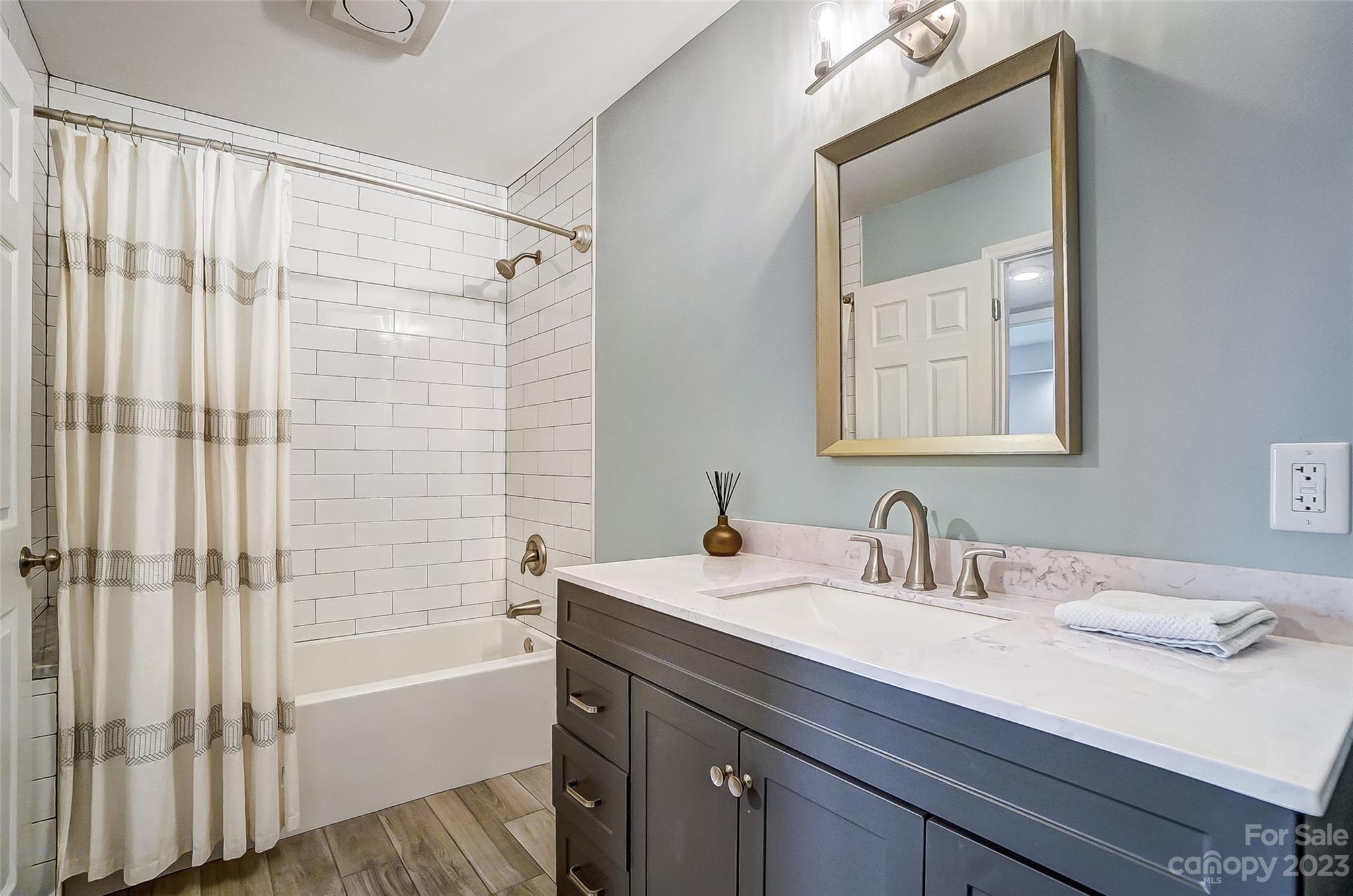 3047 Point Clear Drive Tega Cay, SC 29708 - Photo 33 of 40 a bathroom with a sink and a mirror