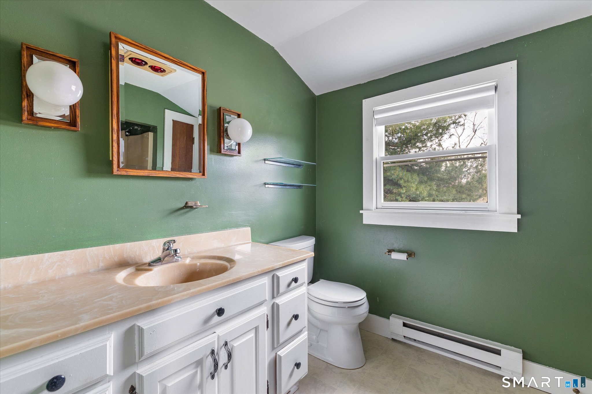 49 Bosworth Road Pomfret, CT 06259 - Photo 36 of 40 a bathroom with a sink mirror and toilet