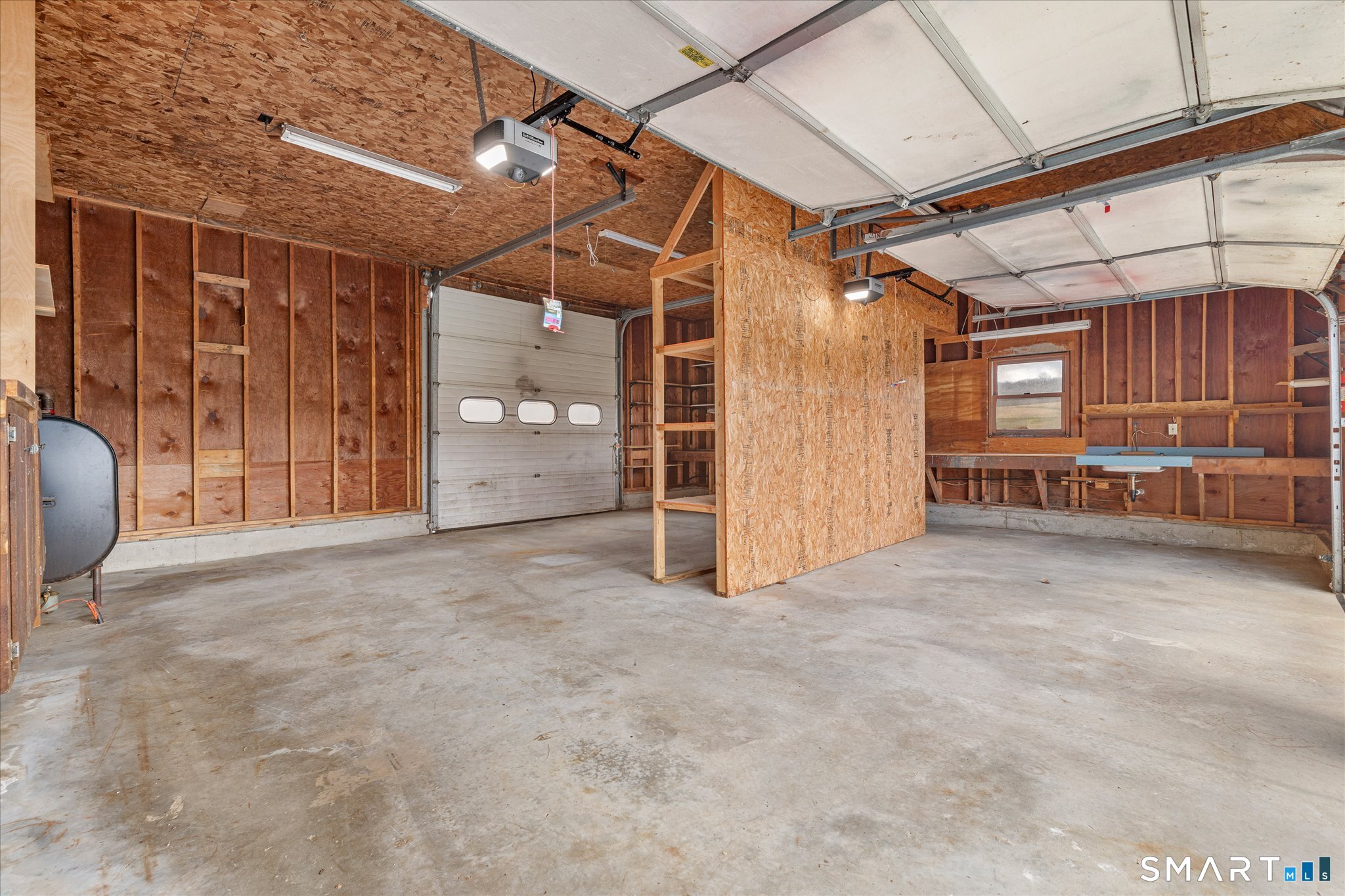 49 Bosworth Road Pomfret, CT 06259 - Photo 38 of 40 a view of a car garage door