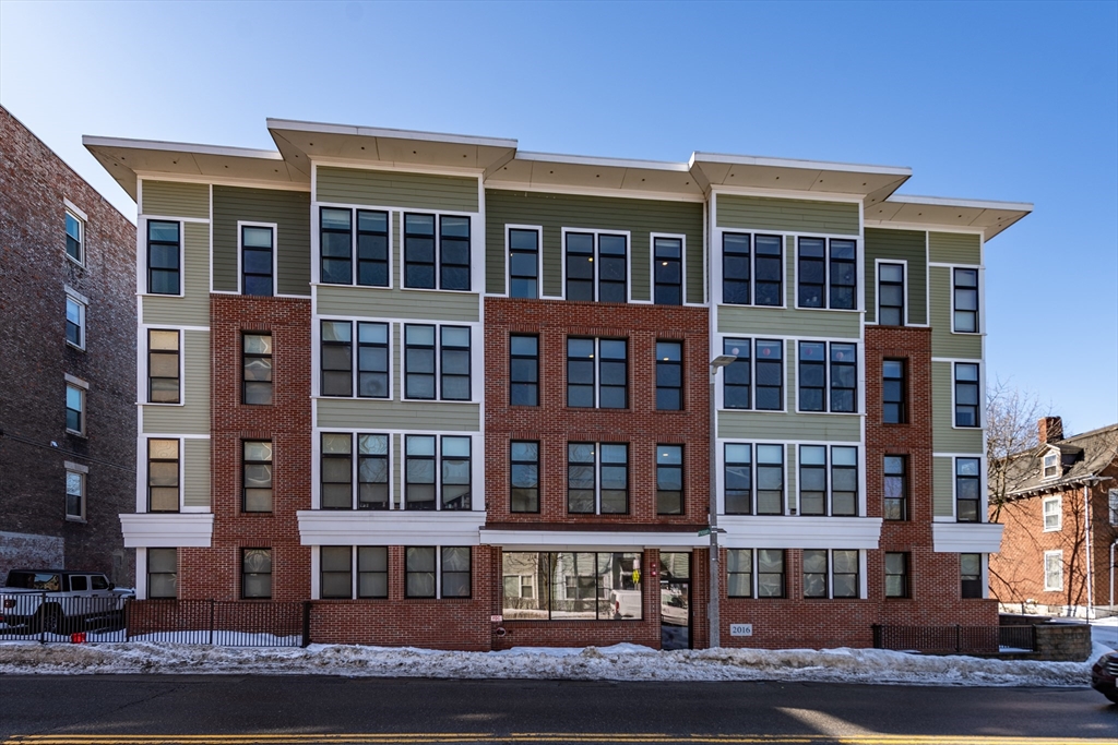299 Dudley Street Boston, MA 02119 - Photo 2 of 18 a front view of a building with windows