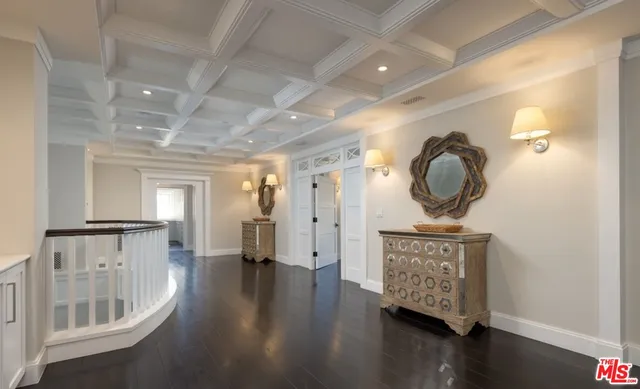 a view of living room with wooden floor