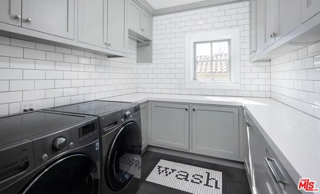 a living room with a couch and a flat screen tv