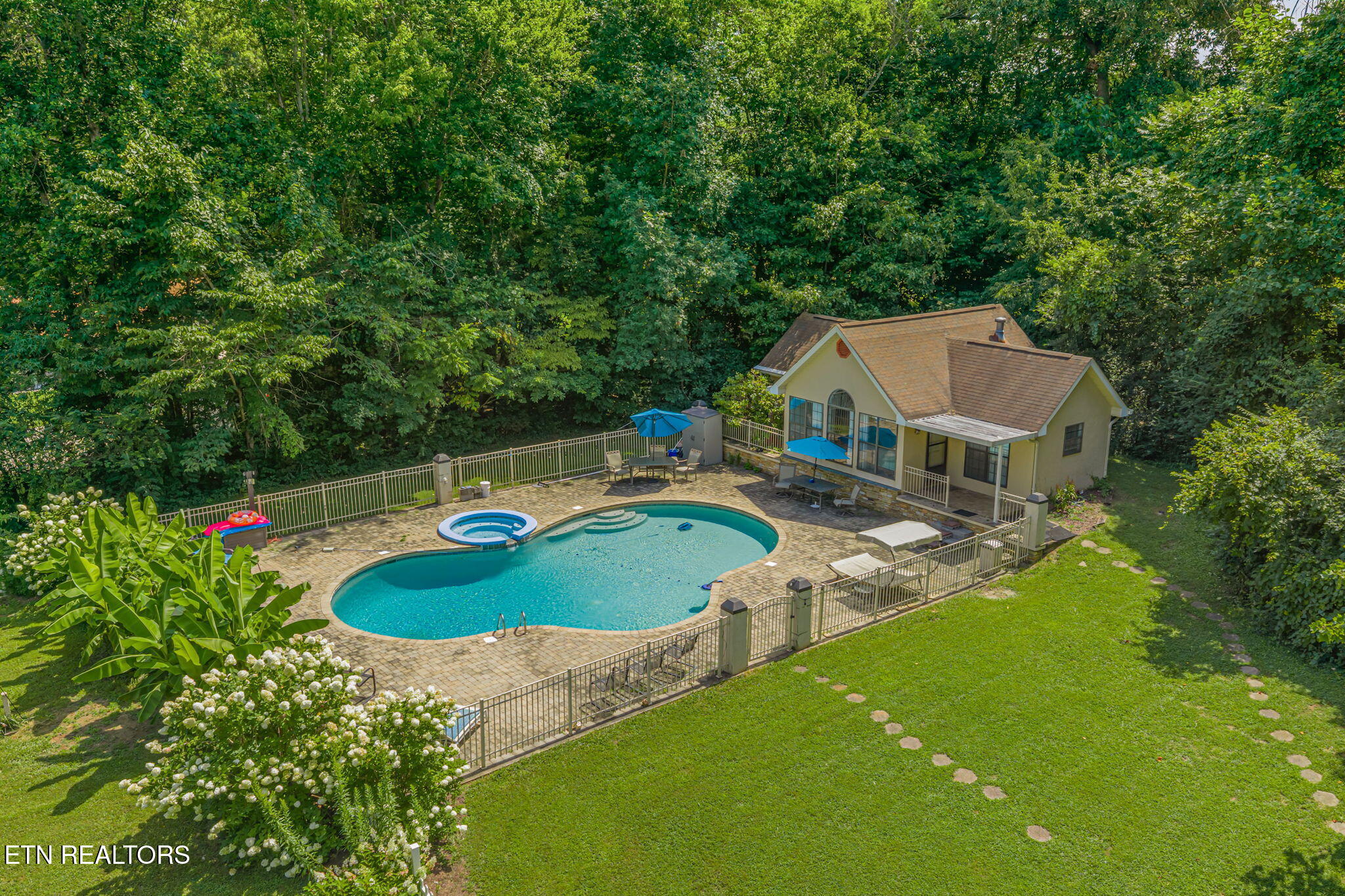 8708 Pedigo Ridge Road Powell, TN 37849 - Photo 40 of 59 Check out the pool and pool house