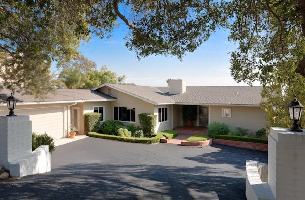 1935 Mission Ridge Road Santa Barbara, CA 93103 - Photo 1 of 10 a front view of house with yard and green space