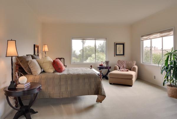 1935 Mission Ridge Road Santa Barbara, CA 93103 - Photo 7 of 10 a bedroom with a bed and large windows