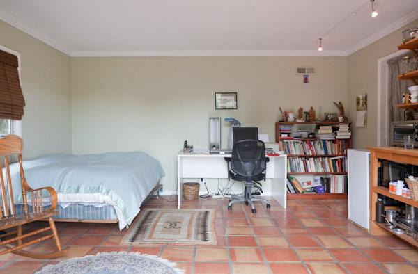 1935 Mission Ridge Road Santa Barbara, CA 93103 - Photo 10 of 10 a bed room with a bed and a book shelf