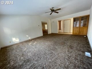 1923 18th Street Baker City, OR 97814 - Photo 3 of 15 a view of a livingroom with a ceiling fan and window