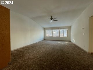 1923 18th Street Baker City, OR 97814 - Photo 4 of 15 a view of room with a ceiling fan