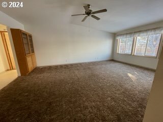 1923 18th Street Baker City, OR 97814 - Photo 5 of 15 a view of an empty room with a window
