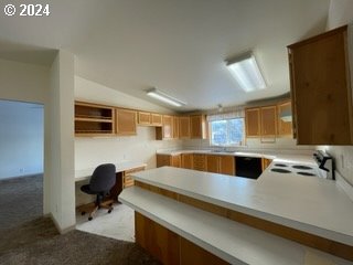 1923 18th Street Baker City, OR 97814 - Photo 7 of 15 a living room with furniture and a flat screen tv