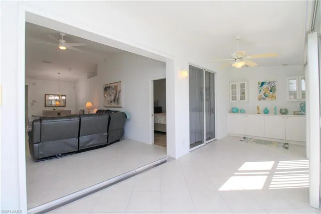 a view of a livingroom with furniture and cabinet