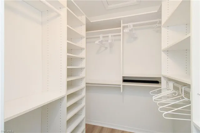 a view of an empty walk in closet