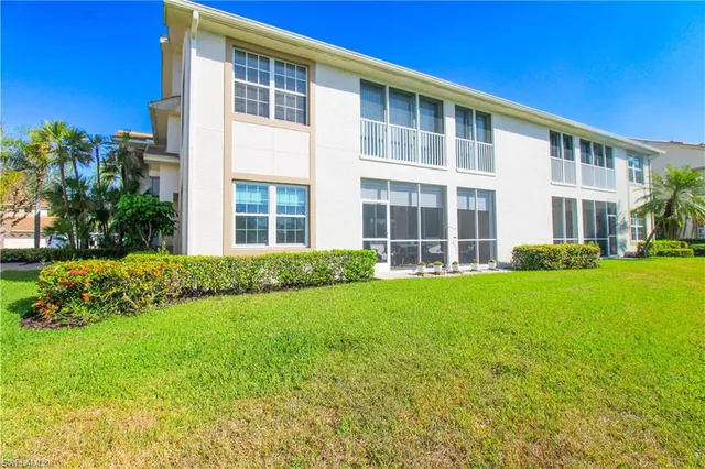 front view of a building with a yard