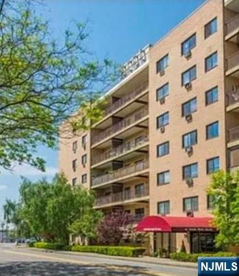 44 Main Street, Unit 6F Lodi, NJ 07644 - Photo 1 of 14 a front view of a building with street view