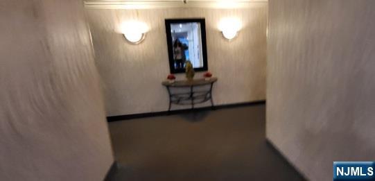 44 Main Street, Unit 6F Lodi, NJ 07644 - Photo 3 of 14 a view of a hallway