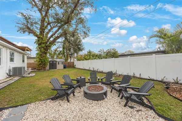 a view of swimming pool with lounge chair