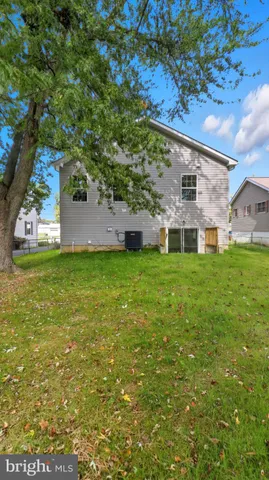 a view of a house with a big yard
