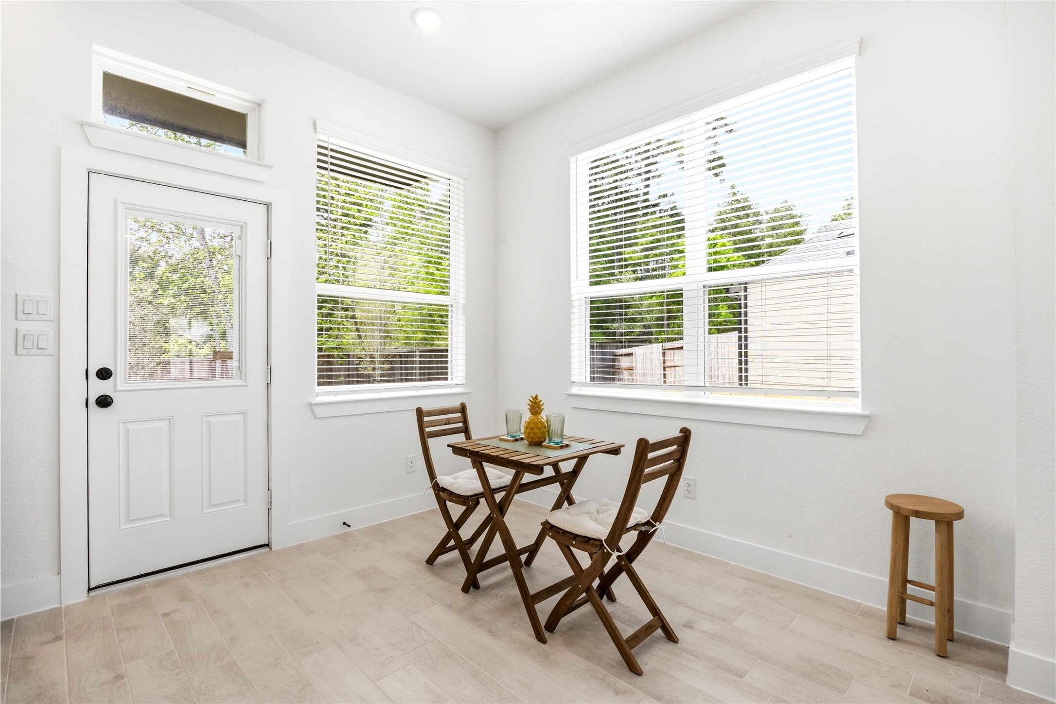 219 Prairie Rose Court Conroe, TX 77318 - Photo 14 of 49 a dining room with furniture and windows
