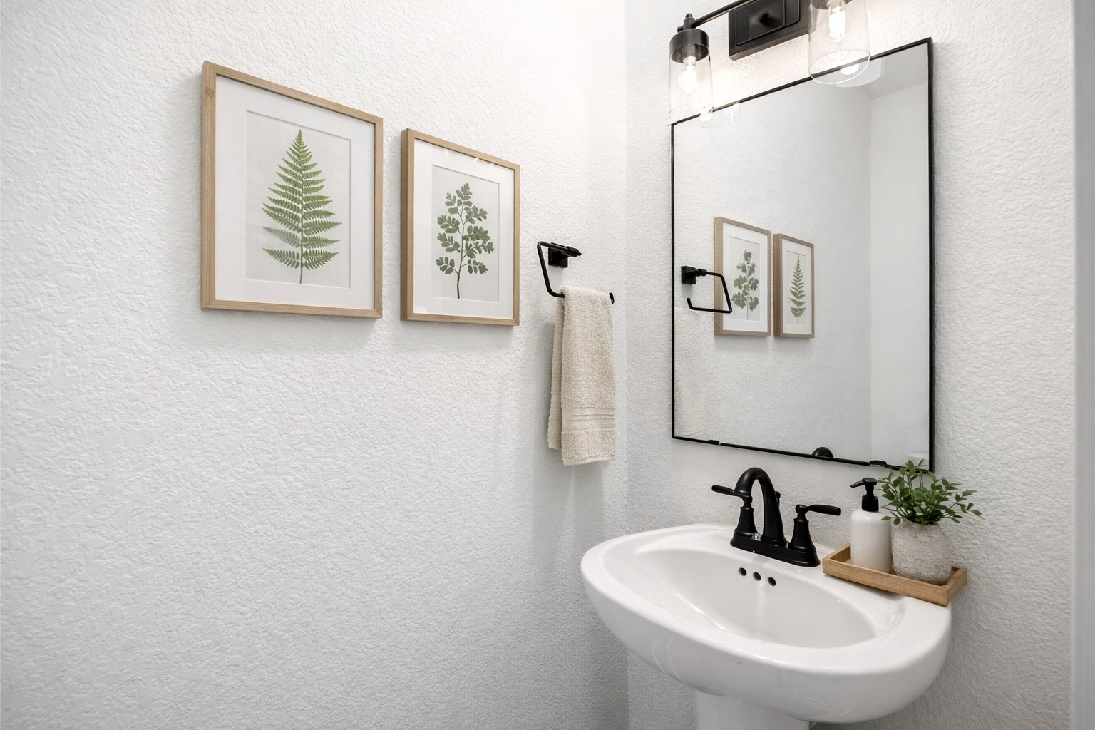 219 Prairie Rose Court Conroe, TX 77318 - Photo 15 of 49 a bathroom with a sink and mirror