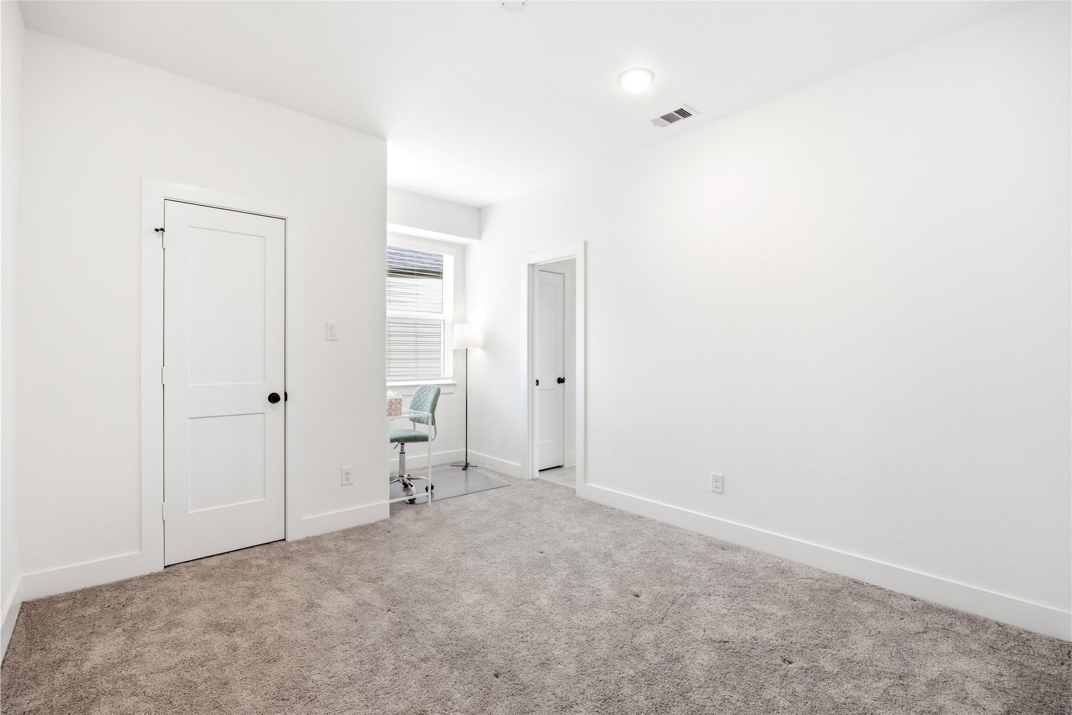 219 Prairie Rose Court Conroe, TX 77318 - Photo 22 of 49 a view of an empty room