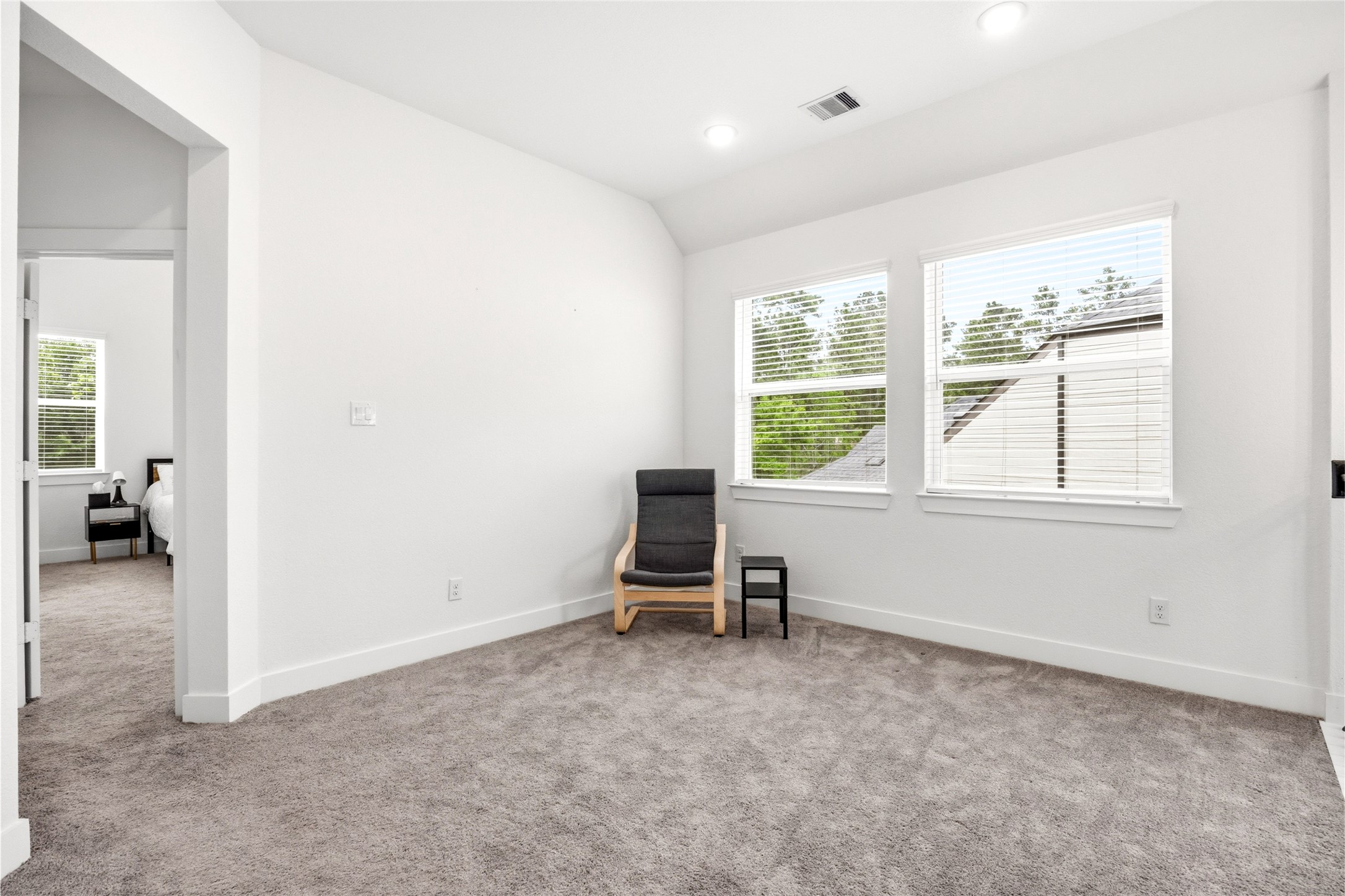 219 Prairie Rose Court Conroe, TX 77318 - Photo 25 of 49 an empty room with a window