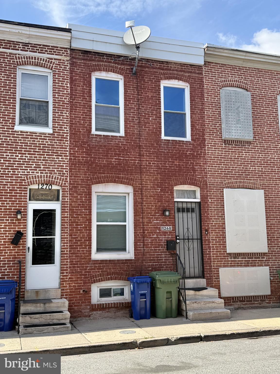 1268 Glyndon Avenue Baltimore, MD 21223 - Photo 30 of 30 a front view of a building with windows