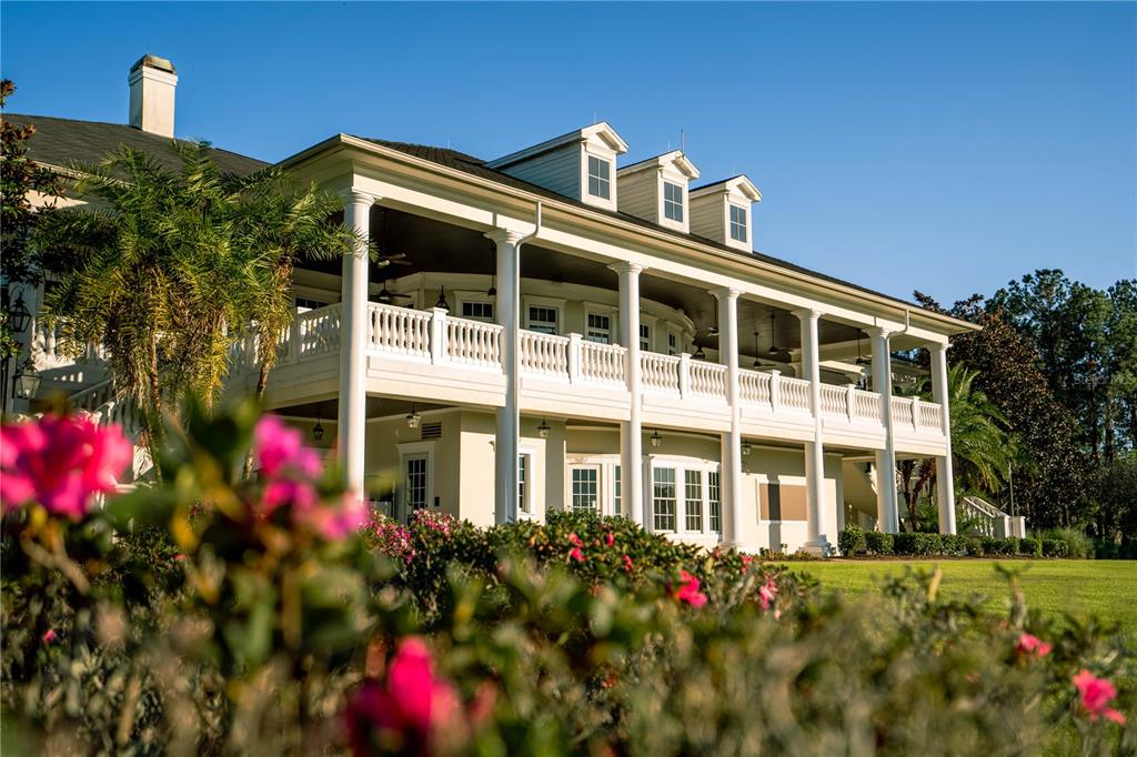5947 Creek Ridge Road Brooksville, FL 34601 - Photo 7 of 8 a front view of a multi story residential apartment building