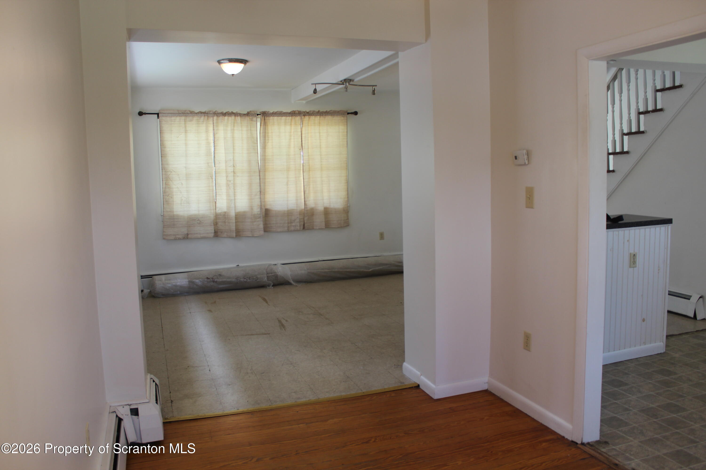 1608 Prospect Avenue Scranton, PA 18505 - Photo 10 of 30 a view of an empty room with a window