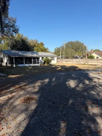 a view of house with outdoor space