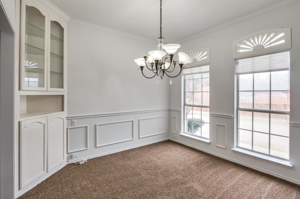 413 Majesty Drive Allen, TX 75013 - Photo 5 of 12 a view of an empty room with a window