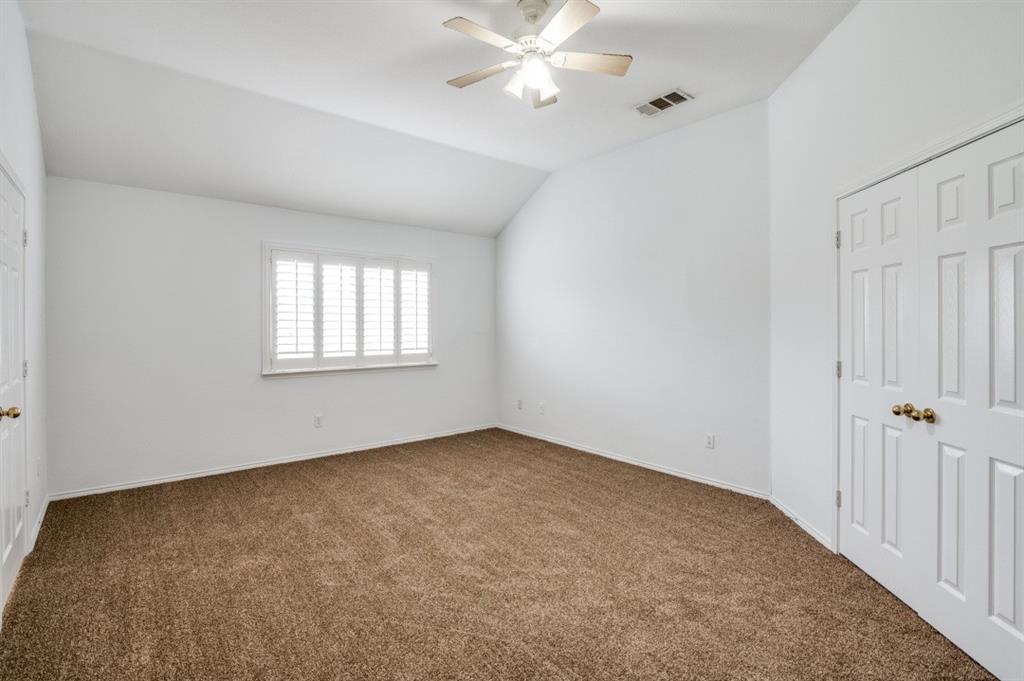 413 Majesty Drive Allen, TX 75013 - Photo 6 of 12 a view of an empty room with a window