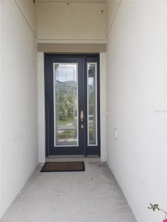 6206 Colmar Place Apollo Beach, FL 33572 - Photo 2 of 26 a view of an empty room and window