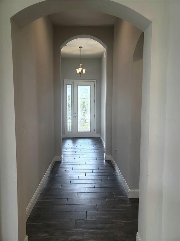 6206 Colmar Place Apollo Beach, FL 33572 - Photo 23 of 26 a view of entryway with wooden floor