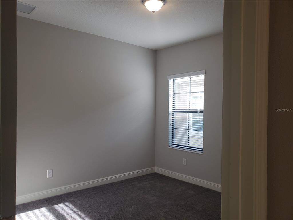 6206 Colmar Place Apollo Beach, FL 33572 - Photo 3 of 26 an empty room with windows