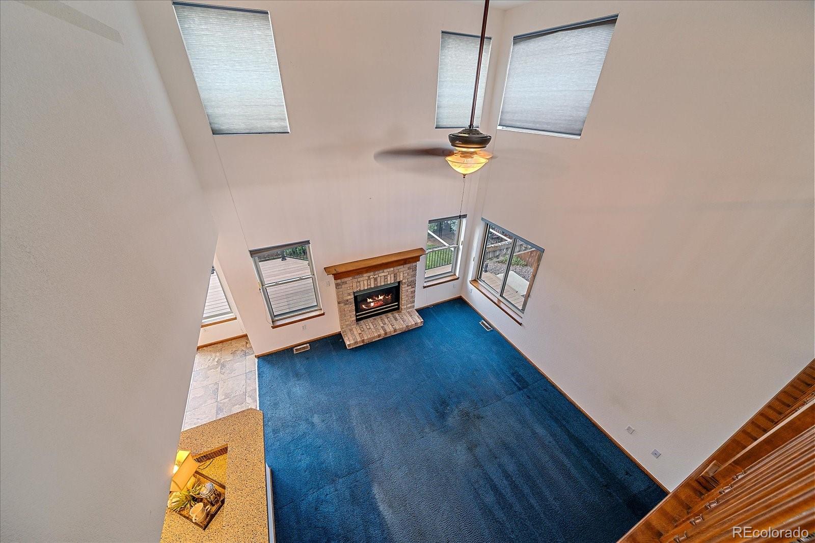 9875 Spring Hill Street Highlands Ranch, CO 80129 - Photo 26 of 38 a view of an entryway with wooden floor
