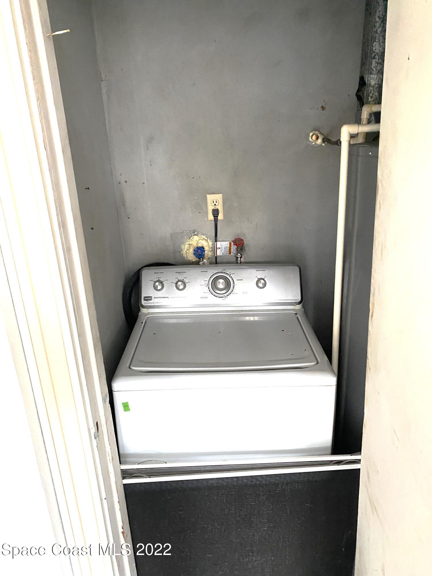 1199 Jordan Court Northeast, Unit B Palm Bay, FL 32905 - Photo 15 of 20 a utility room with washer and dryer