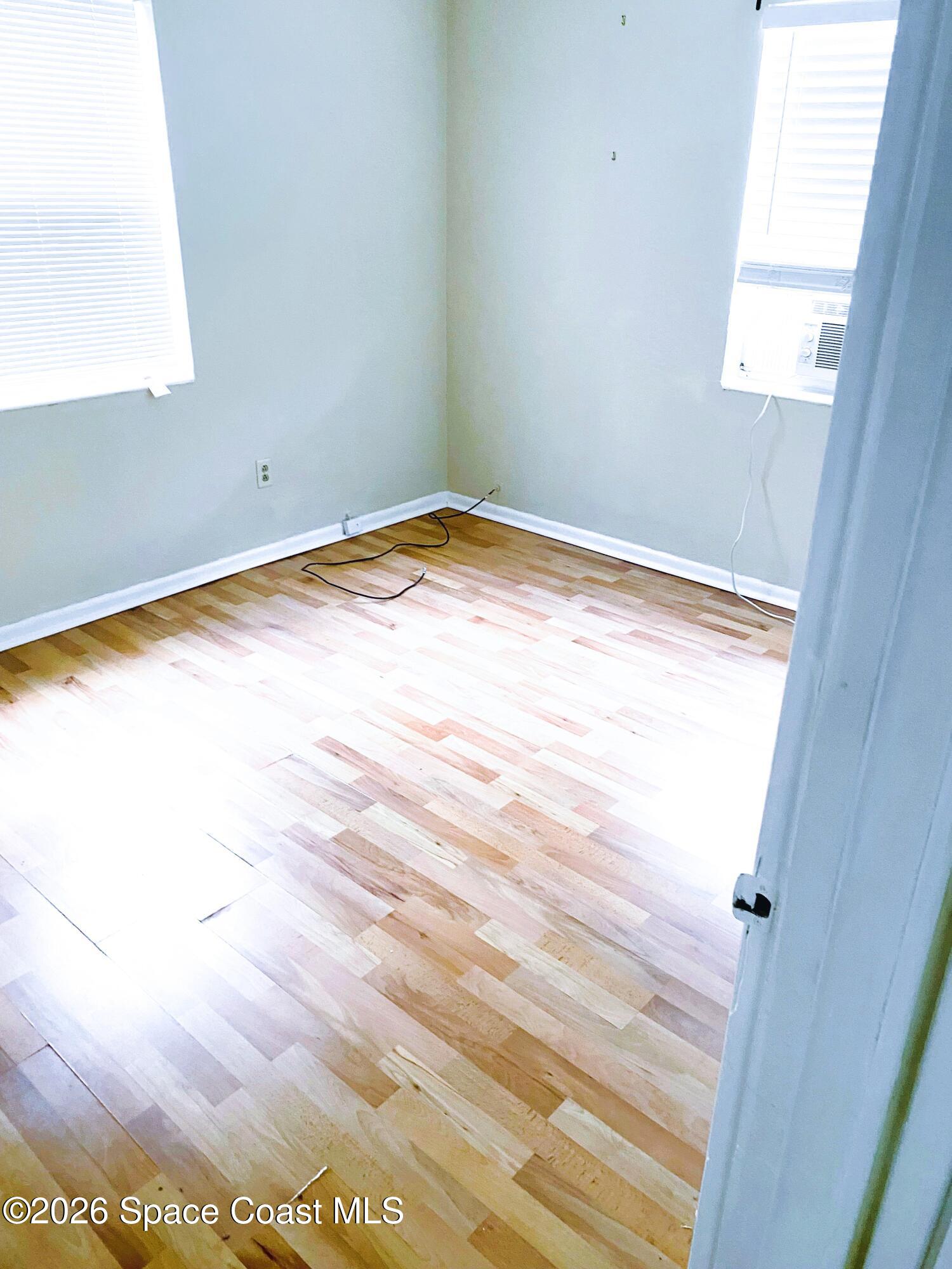 1199 Jordan Court Northeast, Unit B Palm Bay, FL 32905 - Photo 6 of 20 an empty room with window