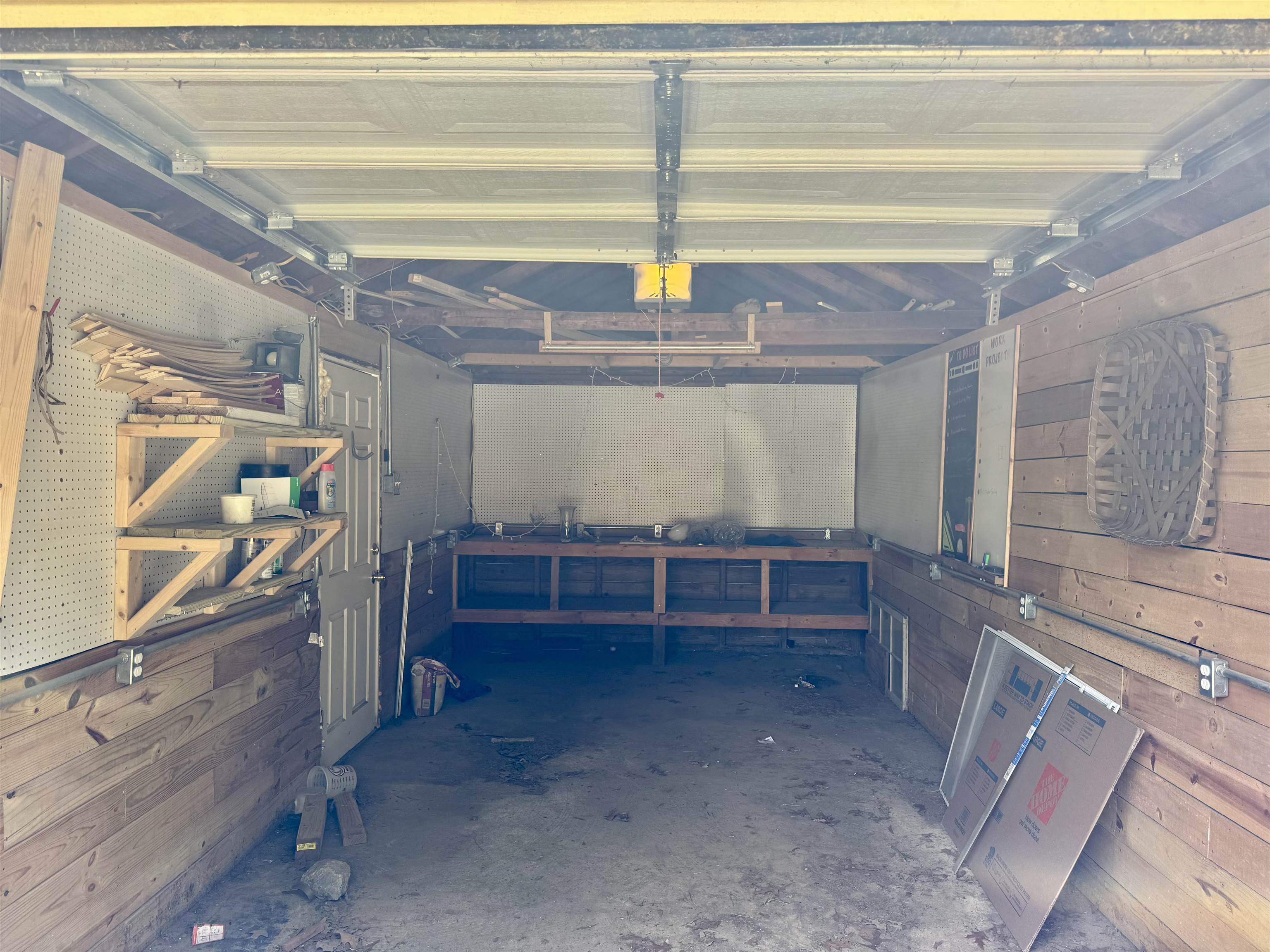 3787 Rhodes Avenue Memphis, TN 38111 - Photo 17 of 23 Garage with wood walls