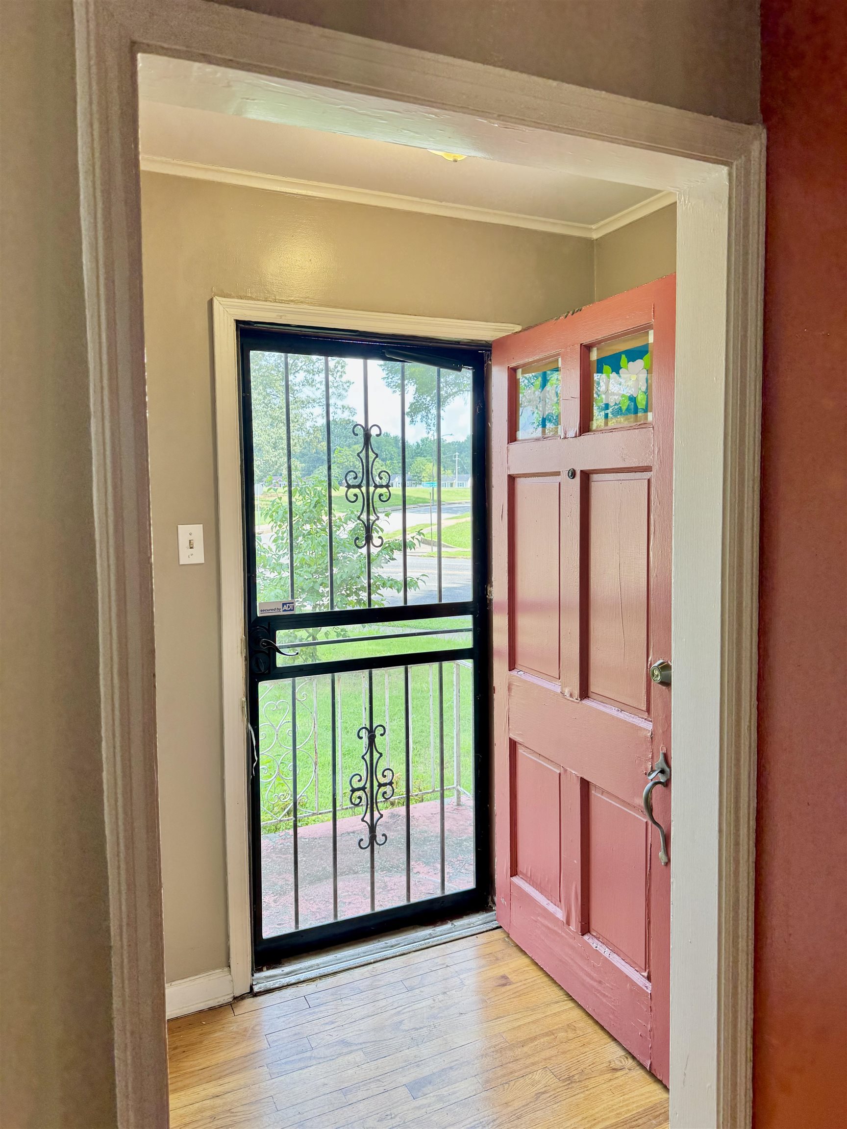 3787 Rhodes Avenue Memphis, TN 38111 - Photo 3 of 23 Entryway with ornamental molding and light wood-style flooring
