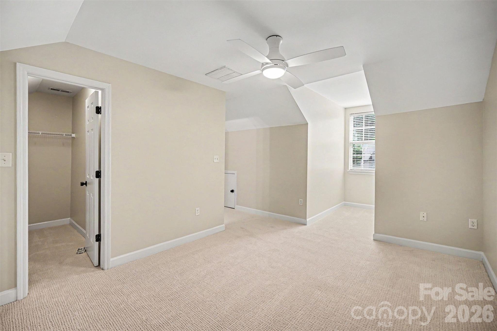 1210 Sheldon Brook Lane Fort Mill, SC 29707 - Photo 14 of 26 a view of an empty room with a fan