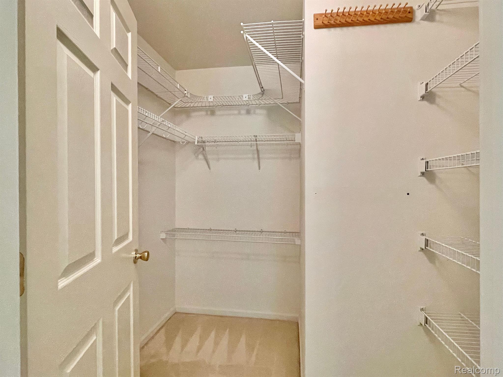 1916 Flagstone Circle, Unit 83 Rochester, MI 48307 - Photo 18 of 31 Primary suite walk-in closet