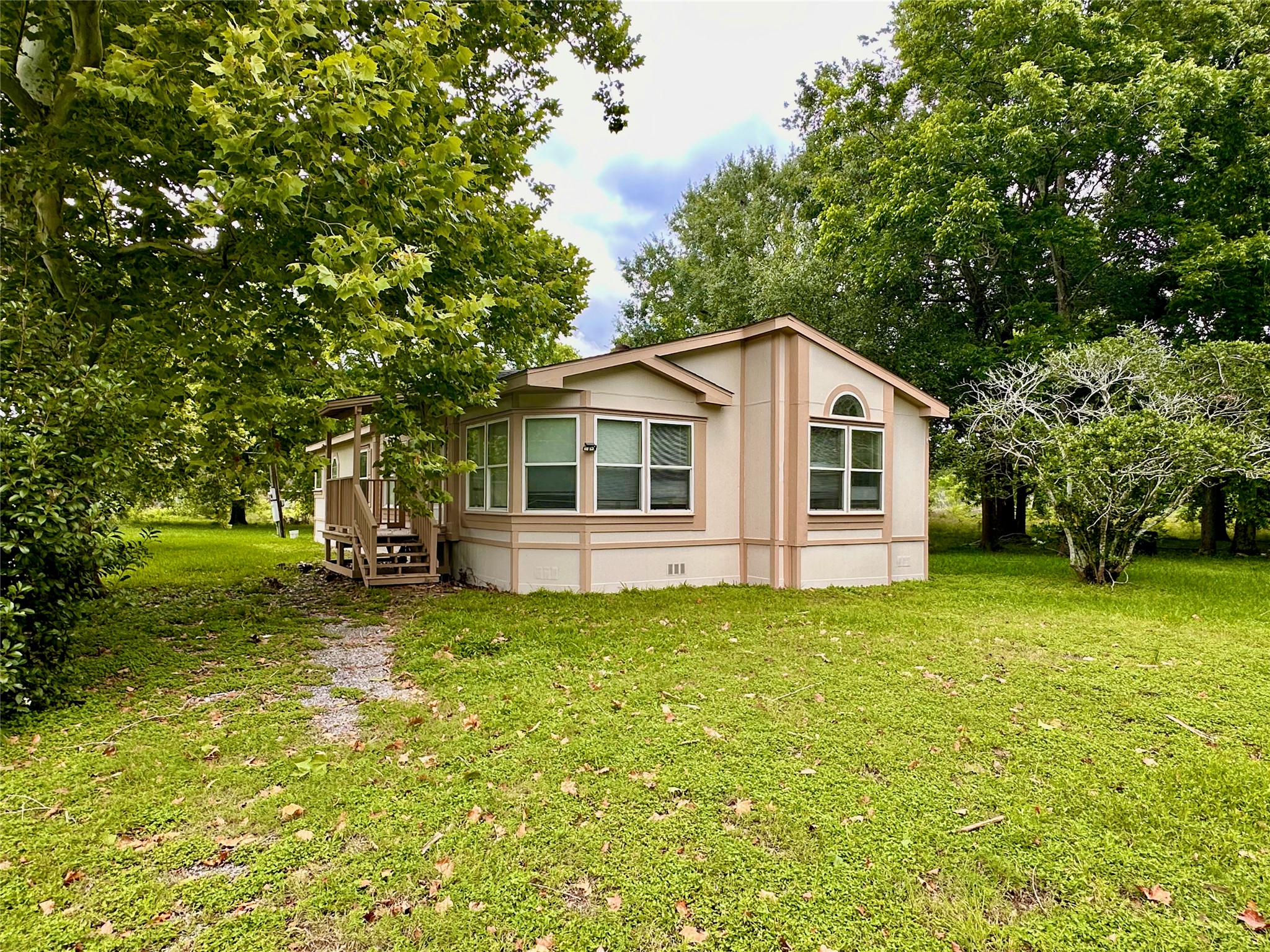 202 Main Street Fresno, TX 77545 - Photo 1 of 26 a view of a house with a yard