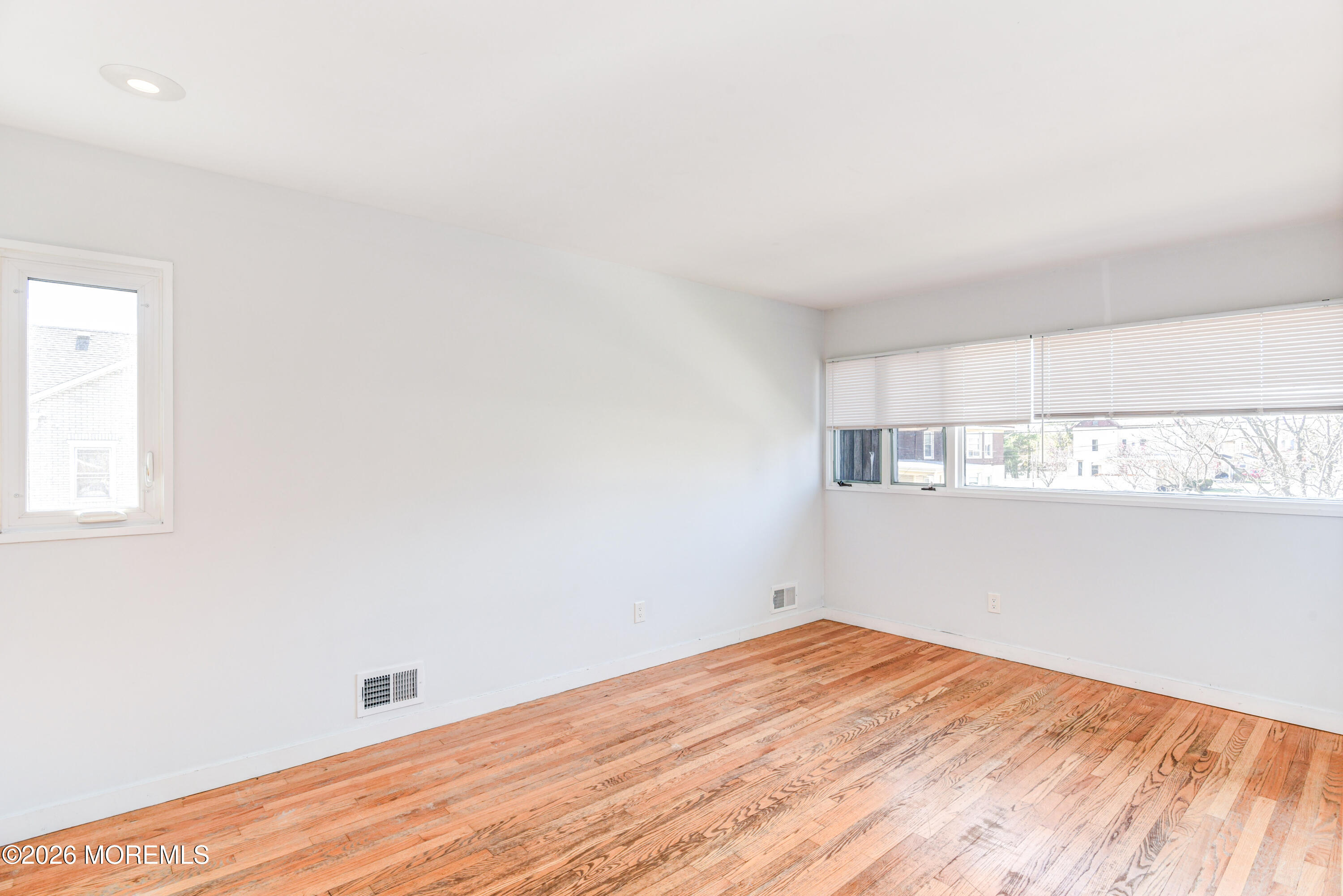 Main Street Milltown, NJ 08850 - Photo 17 of 37 a view of empty room with wooden floor